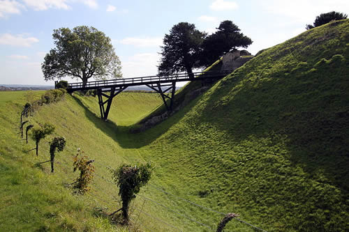 Old Sarum had once been a cathedral city. The people had left, but its Parliamentary seats remained - Old_Sarum_castle_ditch By Nessino (Own work) [CC-BY-SA-3.0 (http://creativecommons.org/licenses/by-sa/3.0)], via Wikimedia Commons